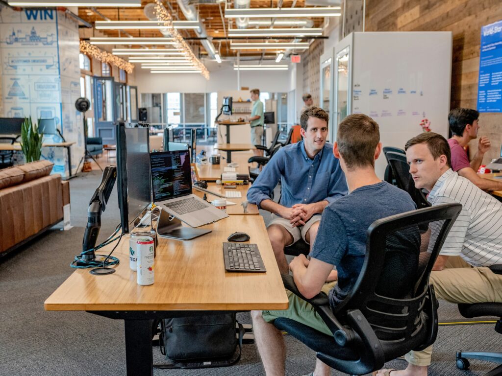 Graphic representing Xendit Work GamificationSummit with employees completing challenges, earning rewards, and collaborating to achieve business objectives.